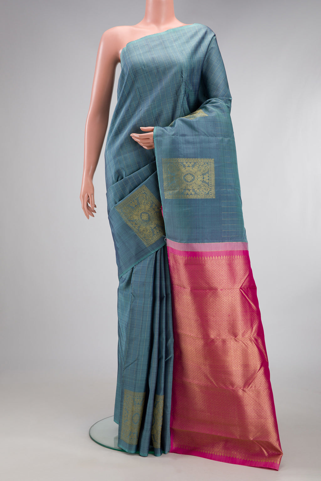 Blue Grey Kanjivaram Silk Saree with Stripes on the body and Without Border.  displayed on a mannequin