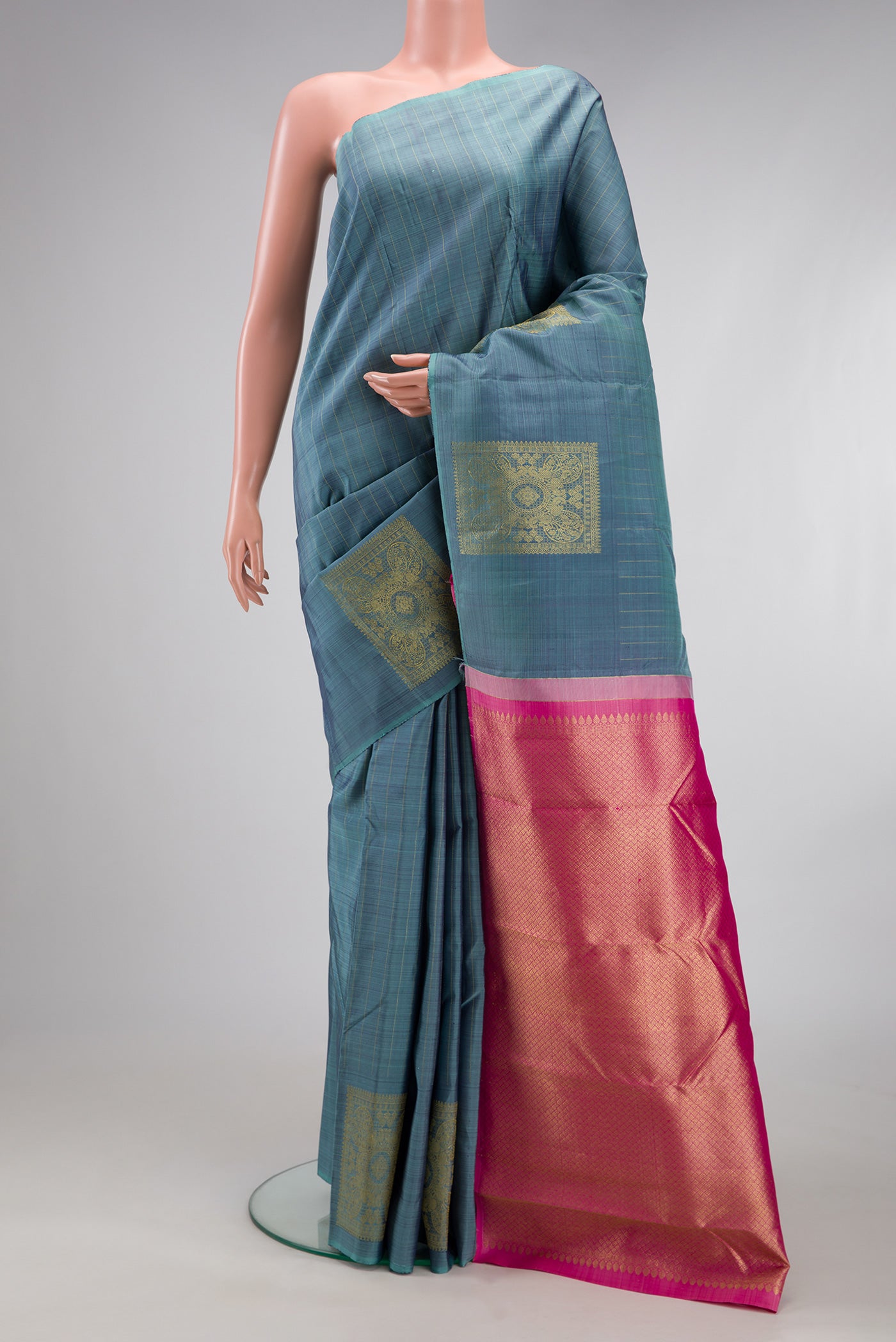 Blue Grey Kanjivaram Silk Saree with Stripes on the body and Without Border.  displayed on a mannequin