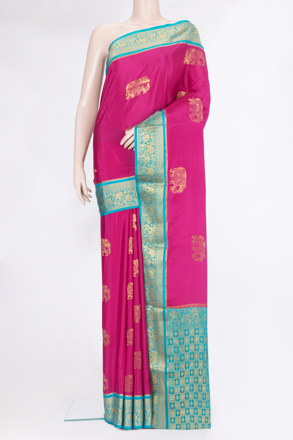 Dark Pink Mysore Silk Saree with Zari Butta on the body and Zari Border.  displayed on a mannequin
