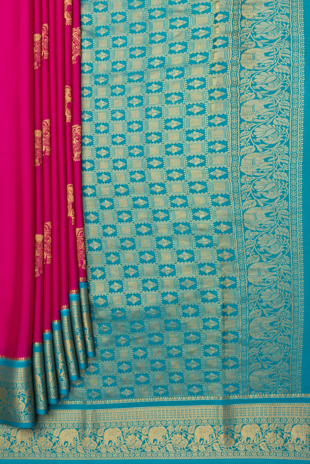 Pleats and pallu of Dark Pink Mysore Silk Saree with Zari Butta on the body and Zari Border. 
