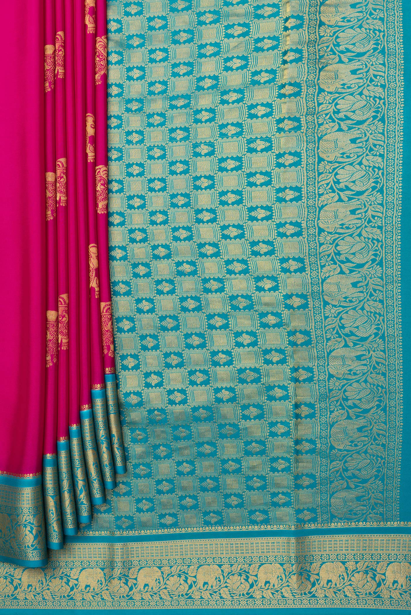 Pleats and pallu of Dark Pink Mysore Silk Saree with Zari Butta on the body and Zari Border. 