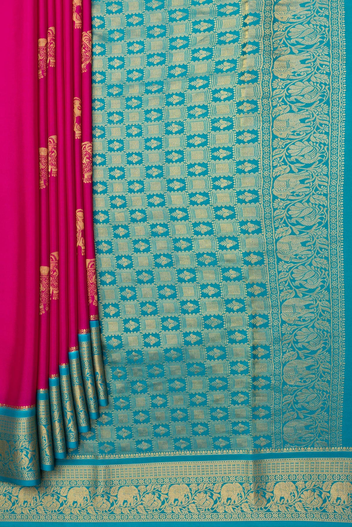 Pleats and pallu of Dark Pink Mysore Silk Saree with Zari Butta on the body and Zari Border. 