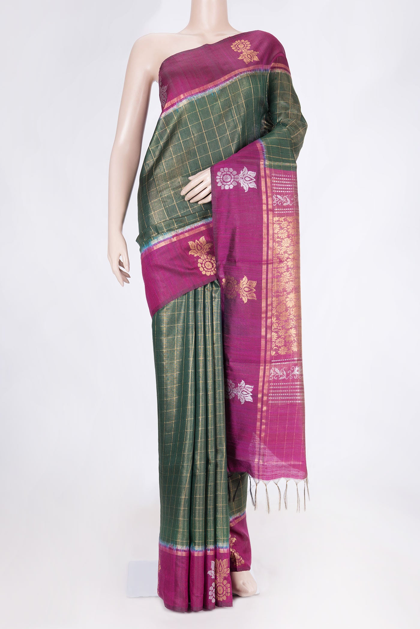 Green Dual Tone Tussar Saree with Checked design on the body and Fancy Border displayed on a mannequin