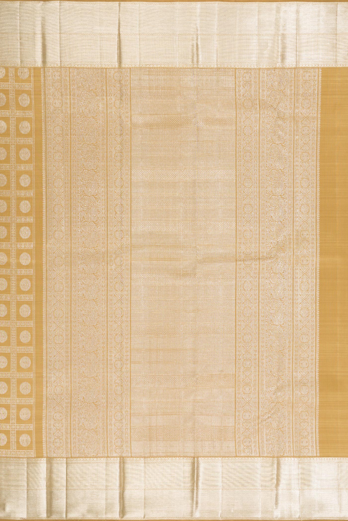 Close up image of the pallu of Sandal Kanchipuram Silk Saree with Zari Brocade on the body and Zari Border. 