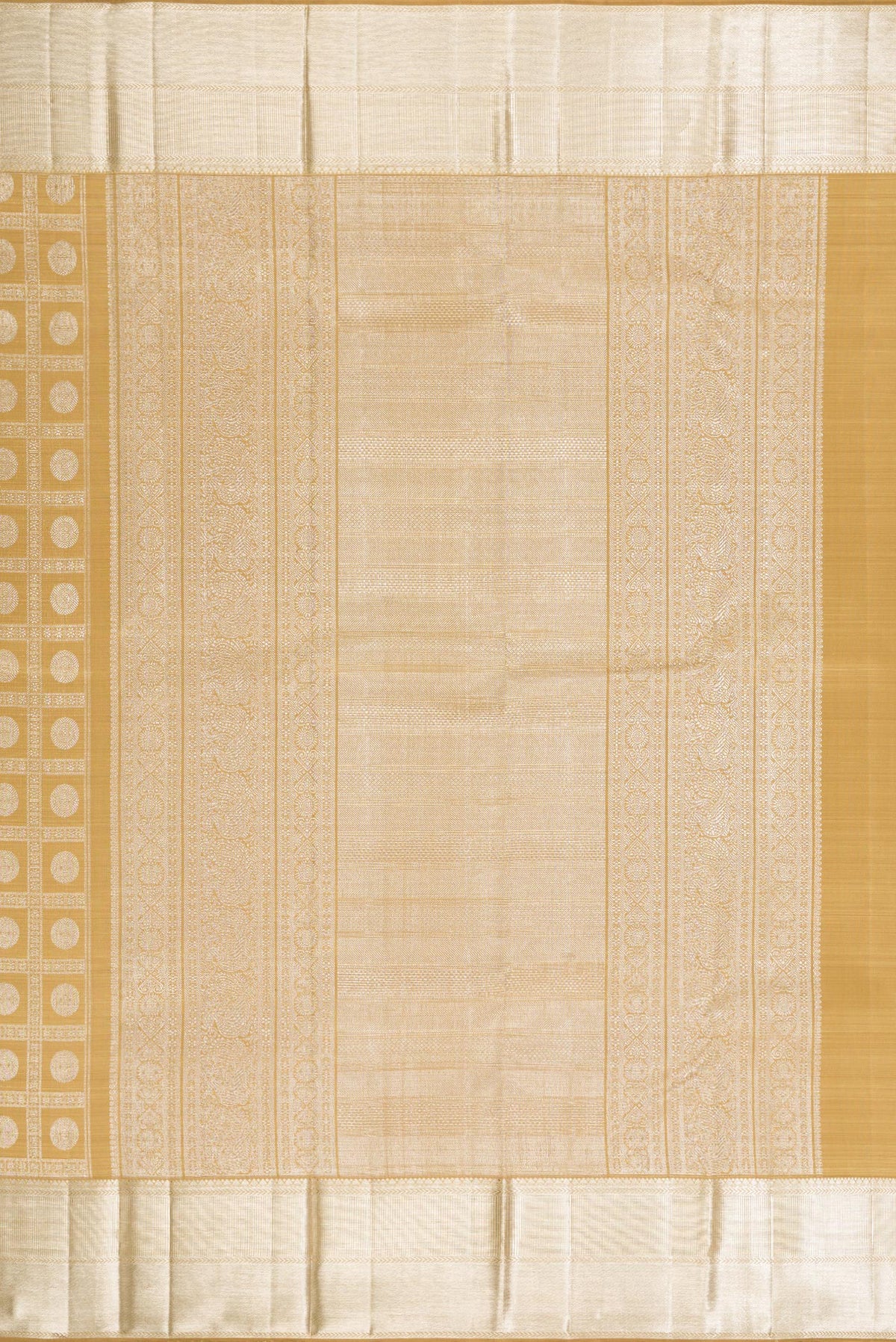 Close up image of the pallu of Sandal Kanchipuram Silk Saree with Zari Brocade on the body and Zari Border. 