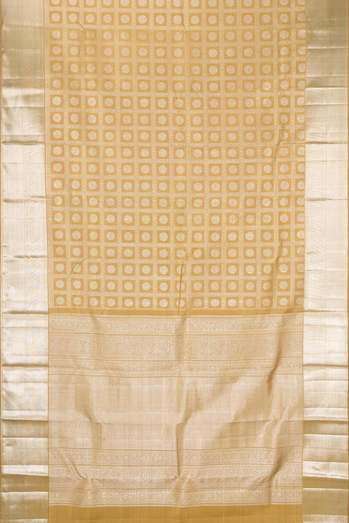 Flat view of Sandal Kanchipuram Silk Saree with Zari Brocade on the body and Zari Border. 
