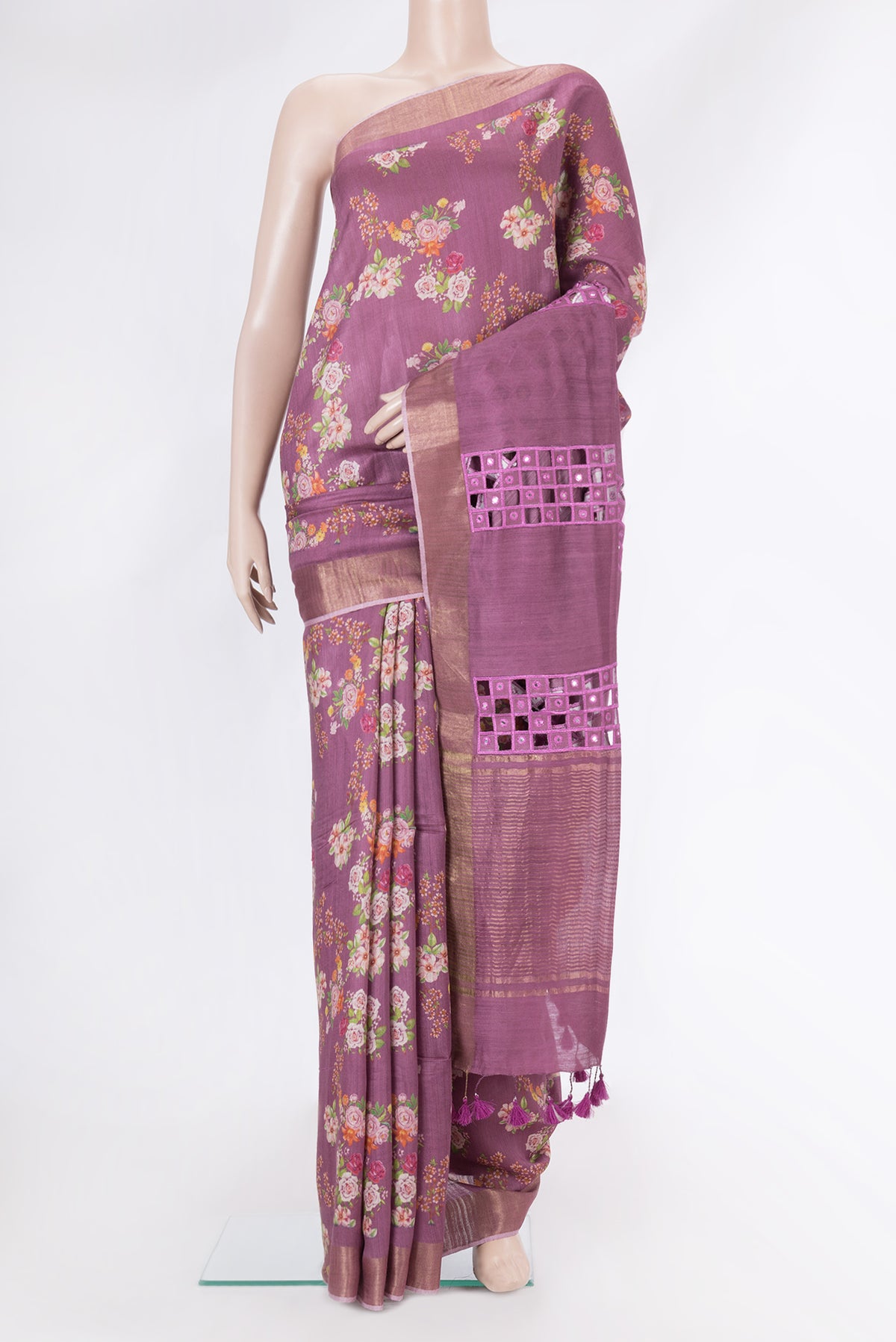 Purple Dual Tone Tussar Silk Saree with Floral Print on the body and Zari Border.  displayed on a mannequin