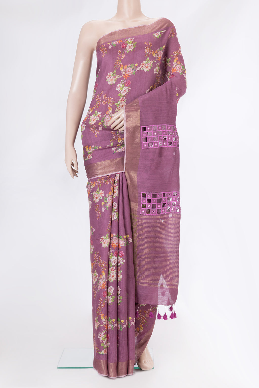 Purple Tussar Silk Saree with Floral Print on the body and Zari Border.  displayed on a mannequin