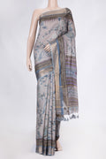 Grey Dual Tone Tussar Saree with Printed design on the body and Zari Border displayed on a mannequin