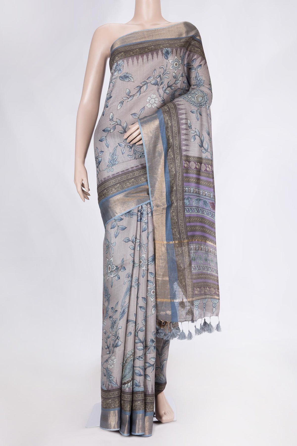Grey Dual Tone Tussar Saree with Printed design on the body and Zari Border displayed on a mannequin