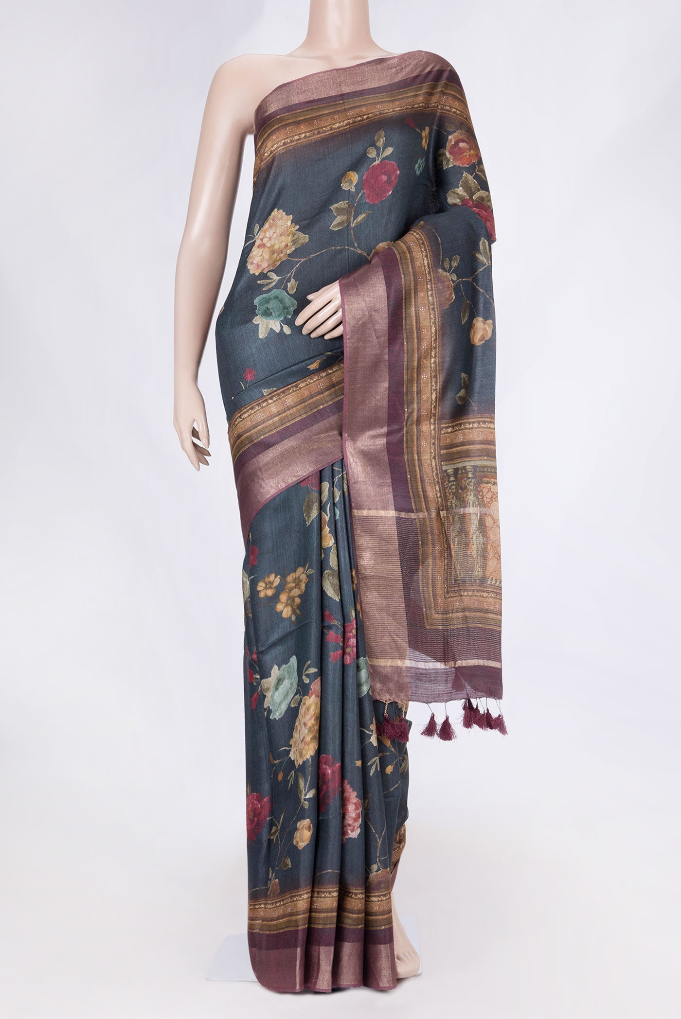 Grey Dual Tone Tussar Saree with Printed design on the body and Zari Border displayed on a mannequin
