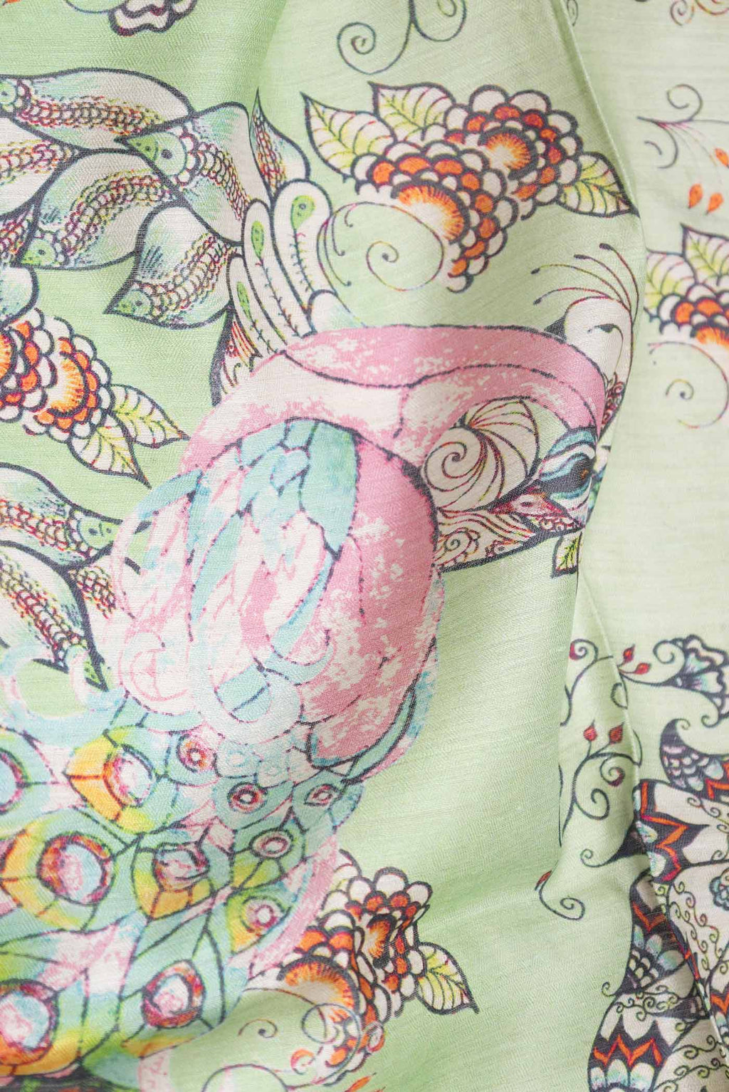 Close up of Green Dual Tone Tussar Saree with Printed design on the body and Zari Border displaying folds