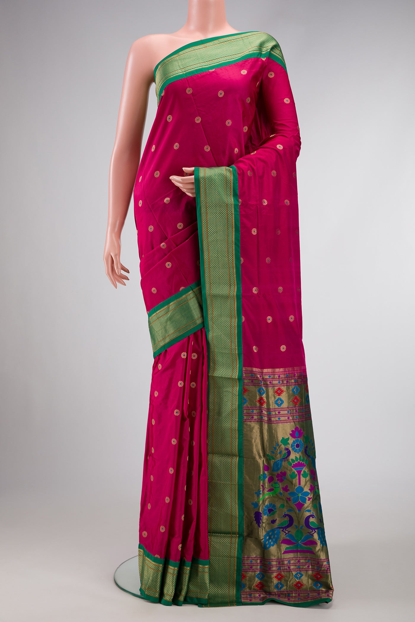 Dark Mauve Dual Tone Paithani Silk Saree with Zari And Thread Butta on the body and Zari Border.  displayed on a mannequin