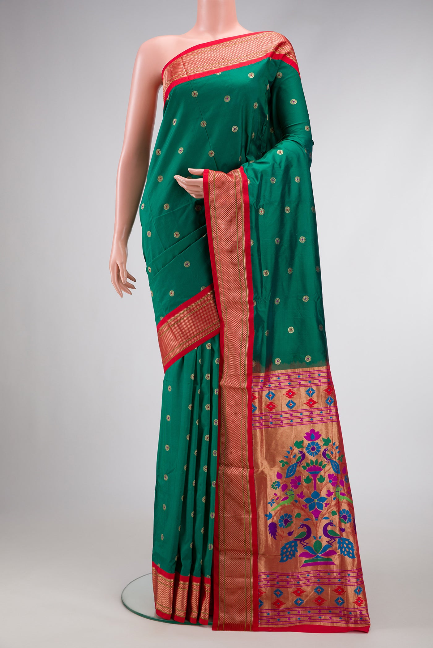 Green Dual Tone Paithani Silk Saree with Zari And Thread Butta on the body and Zari Border.  displayed on a mannequin