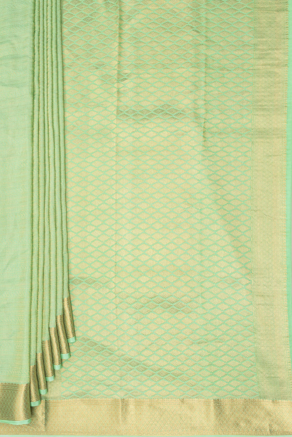 Pleats and pallu of Pista Green Crepe Saree with Zari Brocade on the body and Zari Border. 