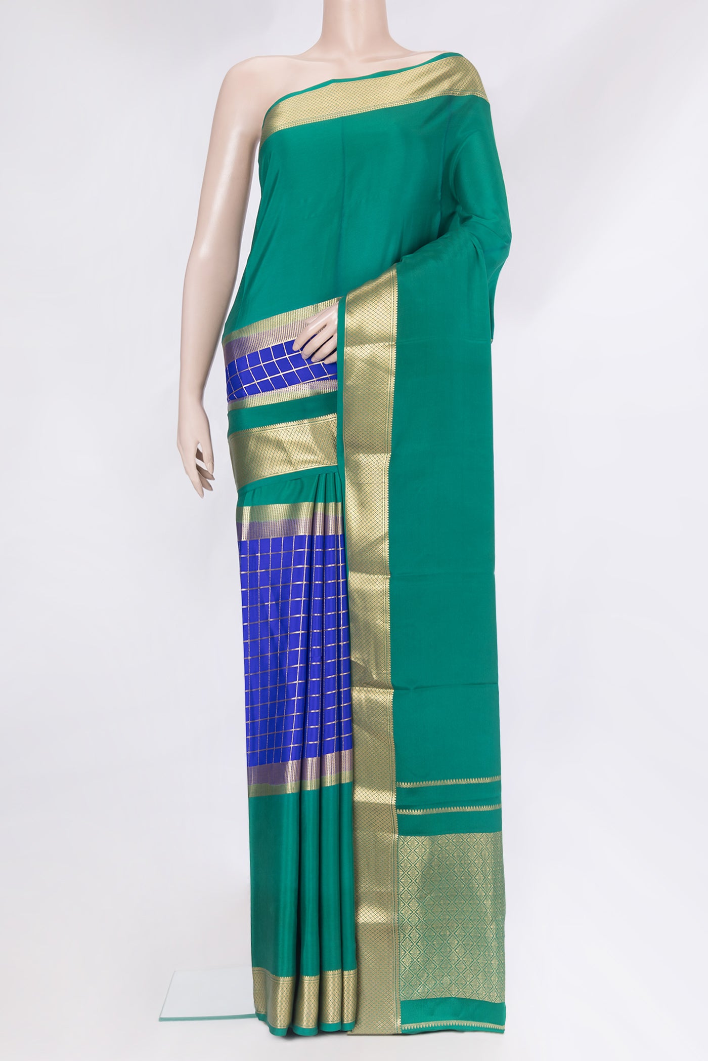 Royal Blue Mysore Silk Saree with Checked design on the body and Zari Border.  displayed on a mannequin