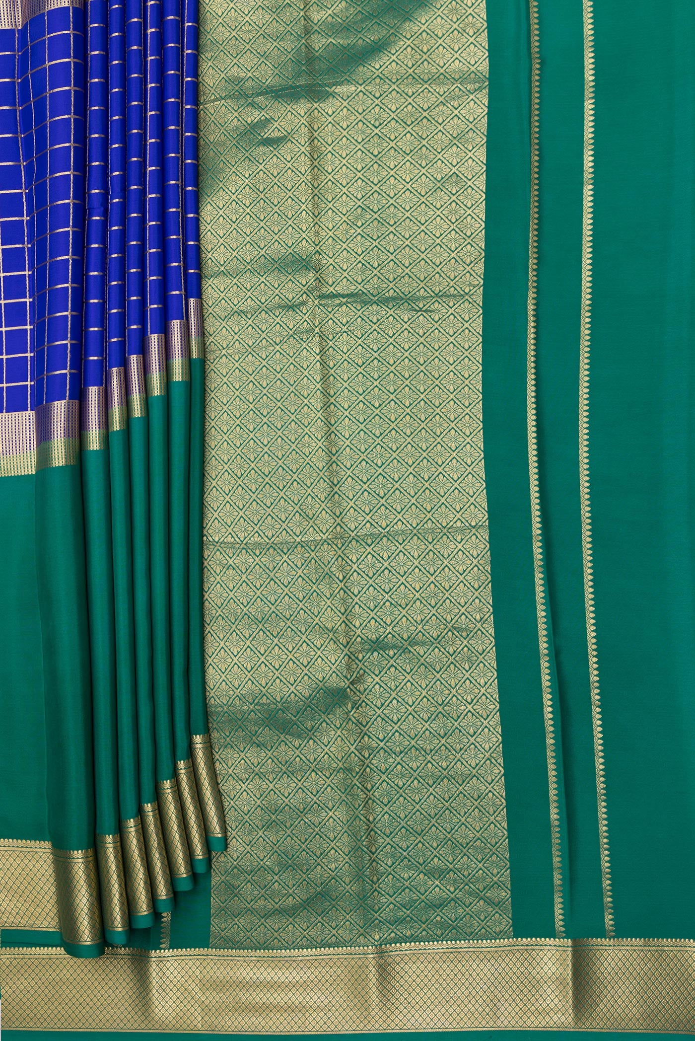 Pleats and pallu of Royal Blue Mysore Silk Saree with Checked design on the body and Zari Border. 