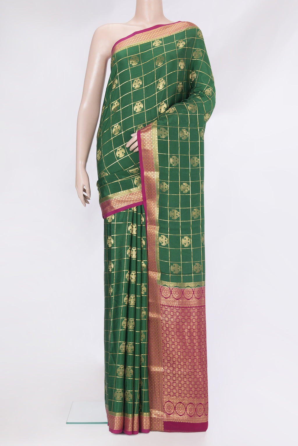 Green Mysore Silk Saree with Checked design on the body and Zari Border.  displayed on a mannequin