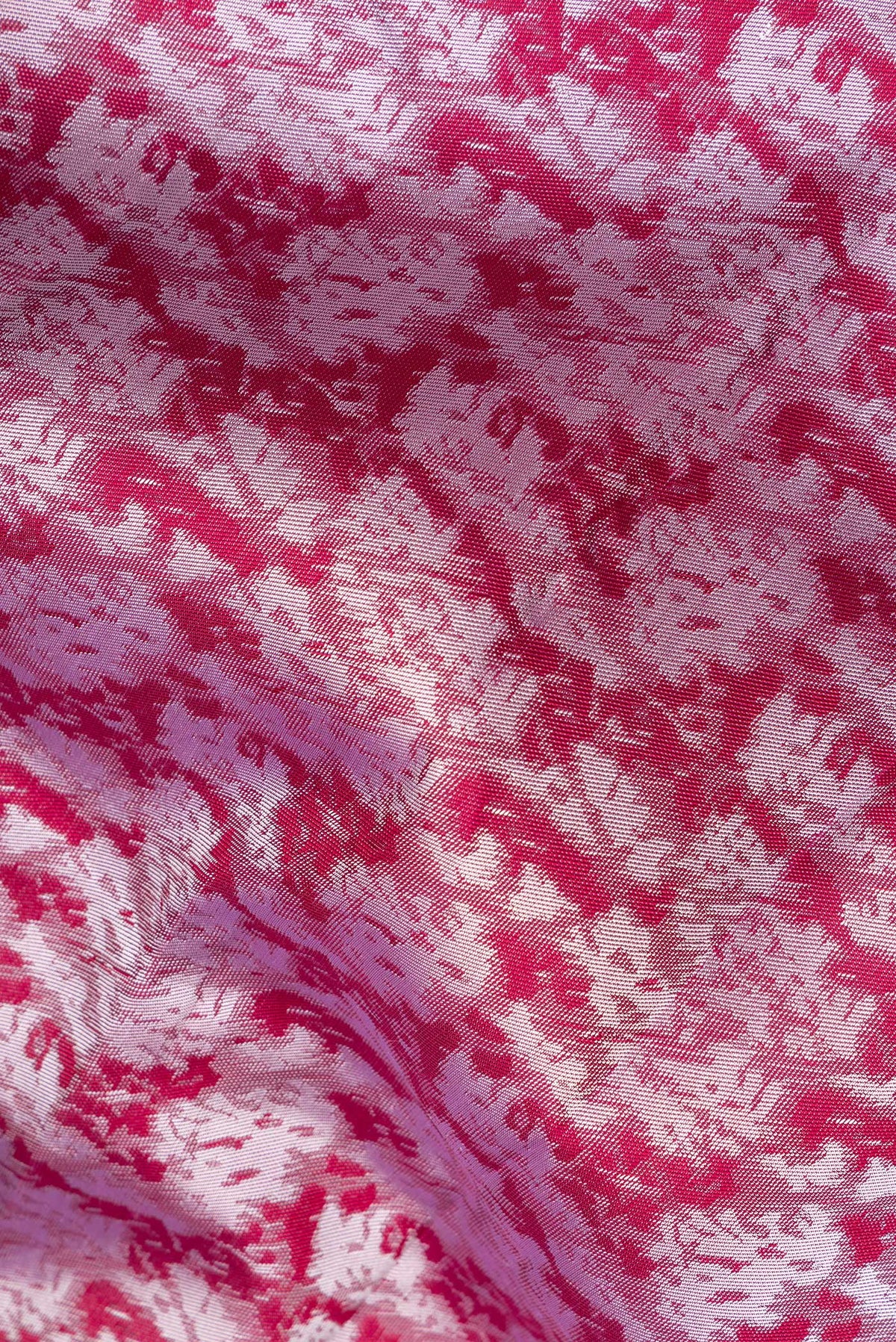 Close up of Pure Silk Maroon Dual Tone Kanchipuram Saree with Jacquard design on the body and Fancy Border.  displaying folds
