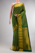 Pure Silk Green Kanjivaram Saree with Zari Brocade on the body and Zari Border.  displayed on a mannequin