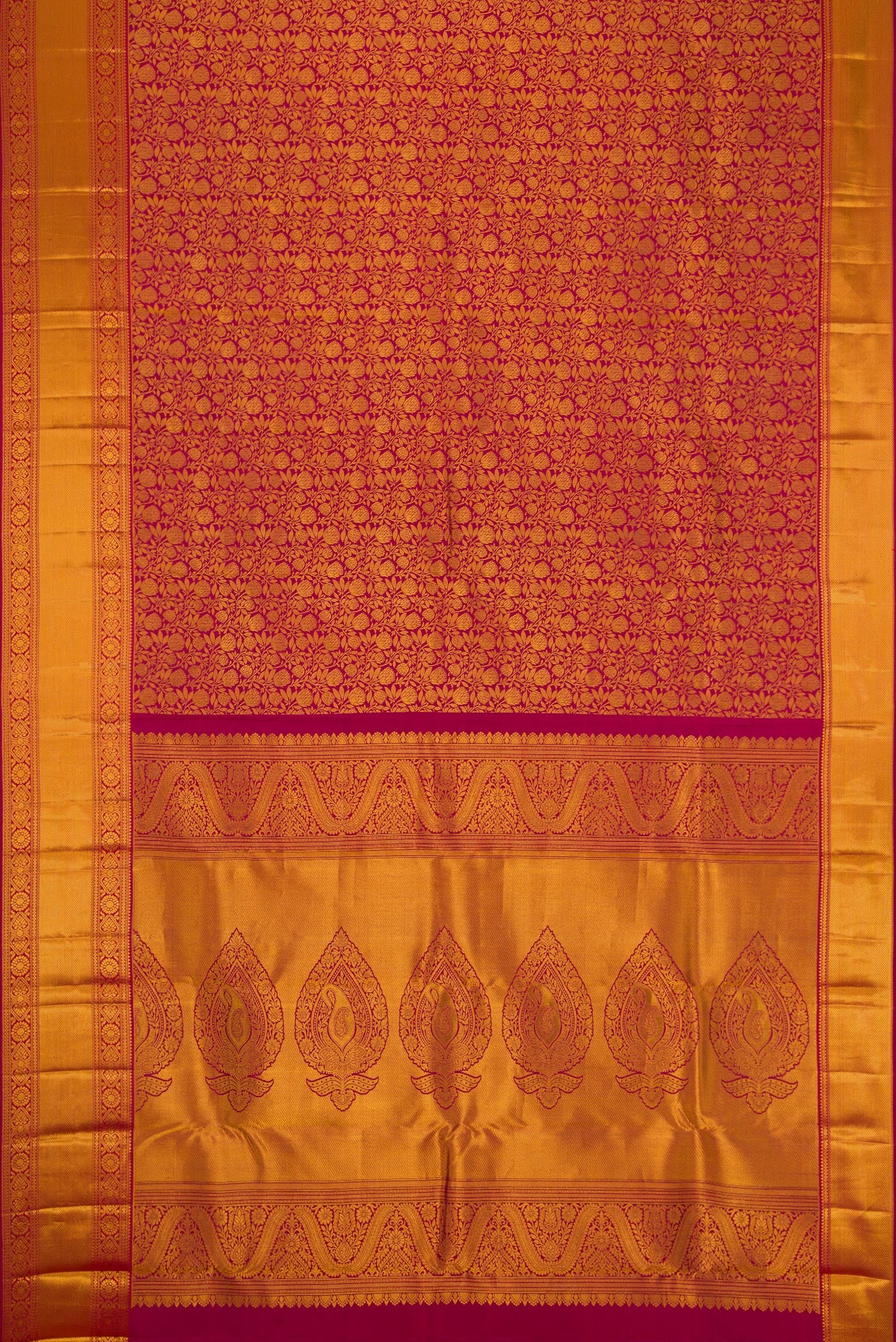 Flat view of Maroon Dual Tone Kanjivaram Silk Saree with Zari Brocade on the body and Zari Border. 