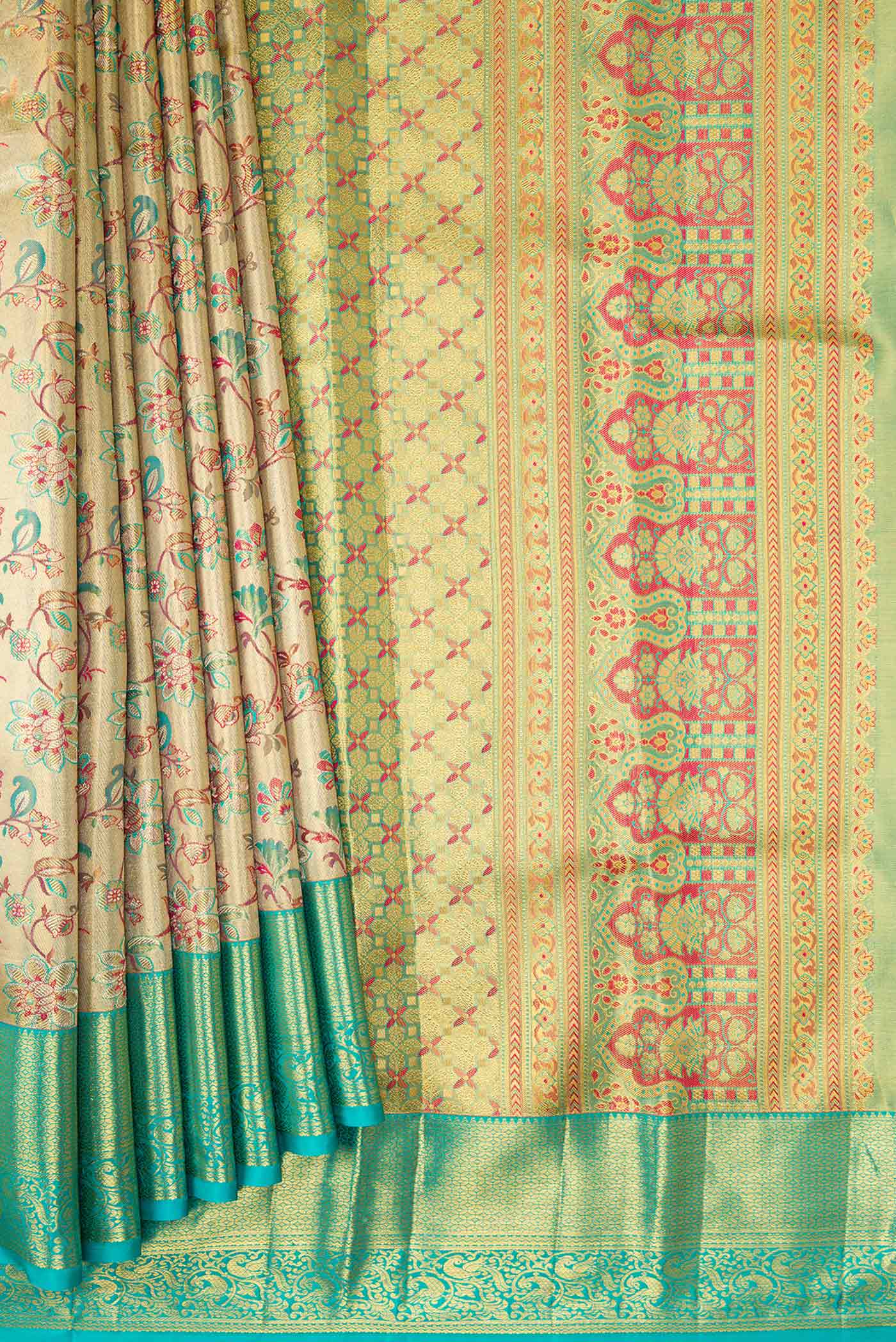 Pleats and pallu of Gold Dual Tone Kanchipuram Tissue Silk Saree with Zari Brocade on the body and Zari Border. 