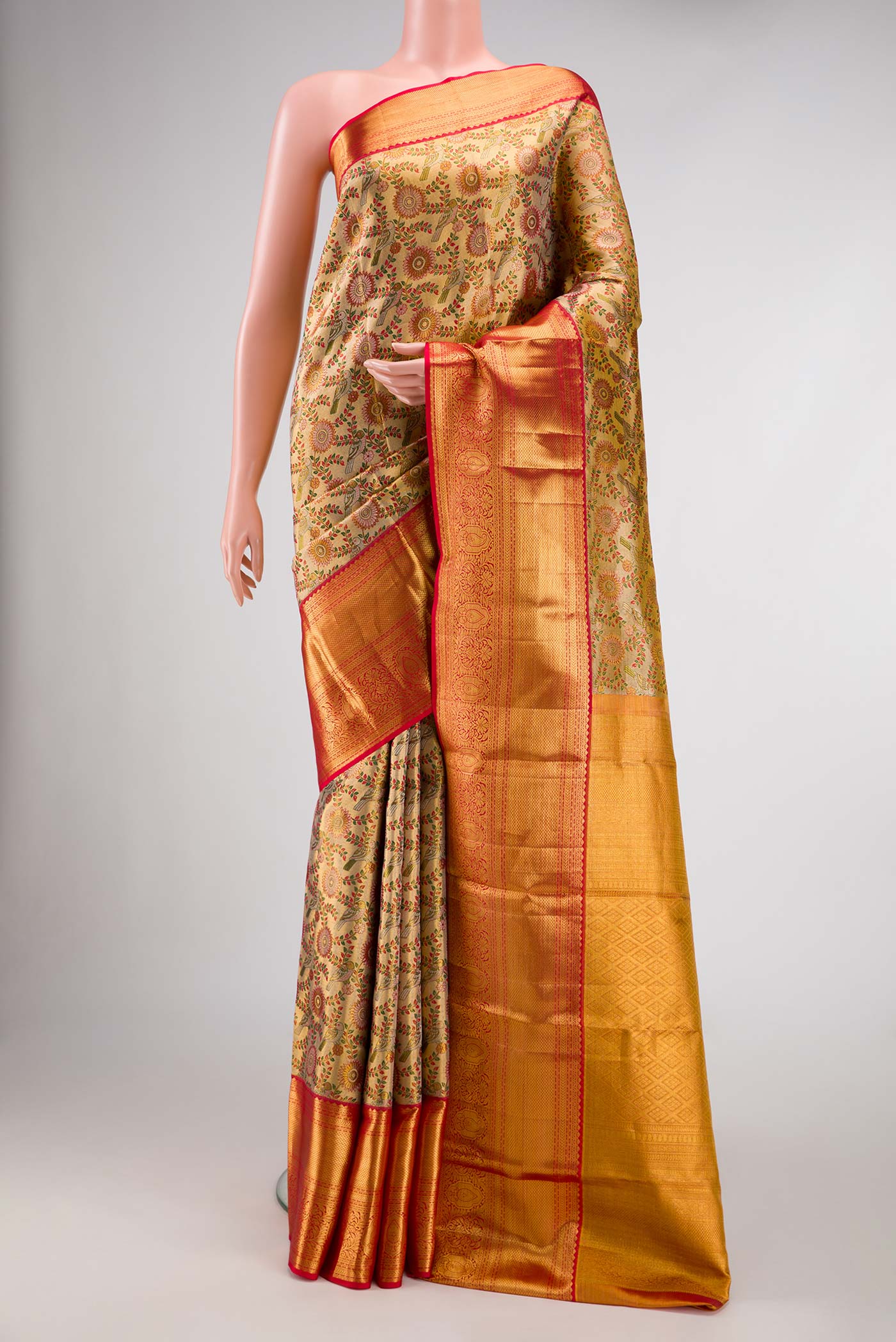 Gold Dual Tone Kanchipuram Tissue Silk Saree with Zari Brocade on the body and Zari Border.  displayed on a mannequin