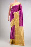 Magenta Dual Tone Kanchipuram Silk Saree with Zari Brocade on the body and Zari Border.  displayed on a mannequin
