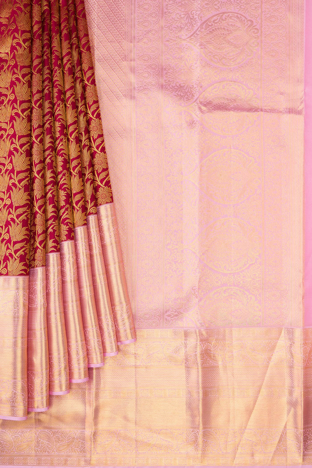Pleats and pallu of Maroon Dual Tone Kanchipuram Silk Saree with Zari Brocade on the body and Zari Border. 