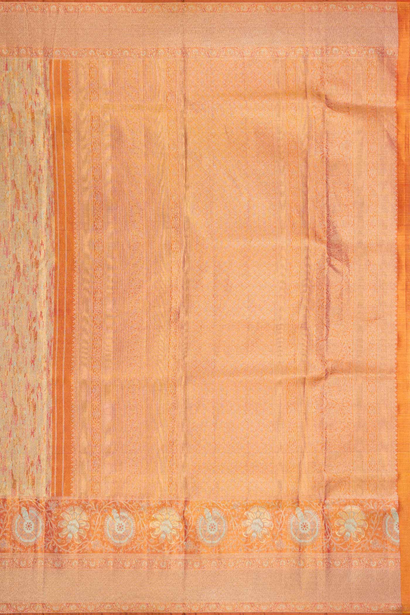 Close up image of the pallu of Gold Dual Tone Kanjivaram Tissue Silk Saree with Zari Brocade on the body and Zari Border. 