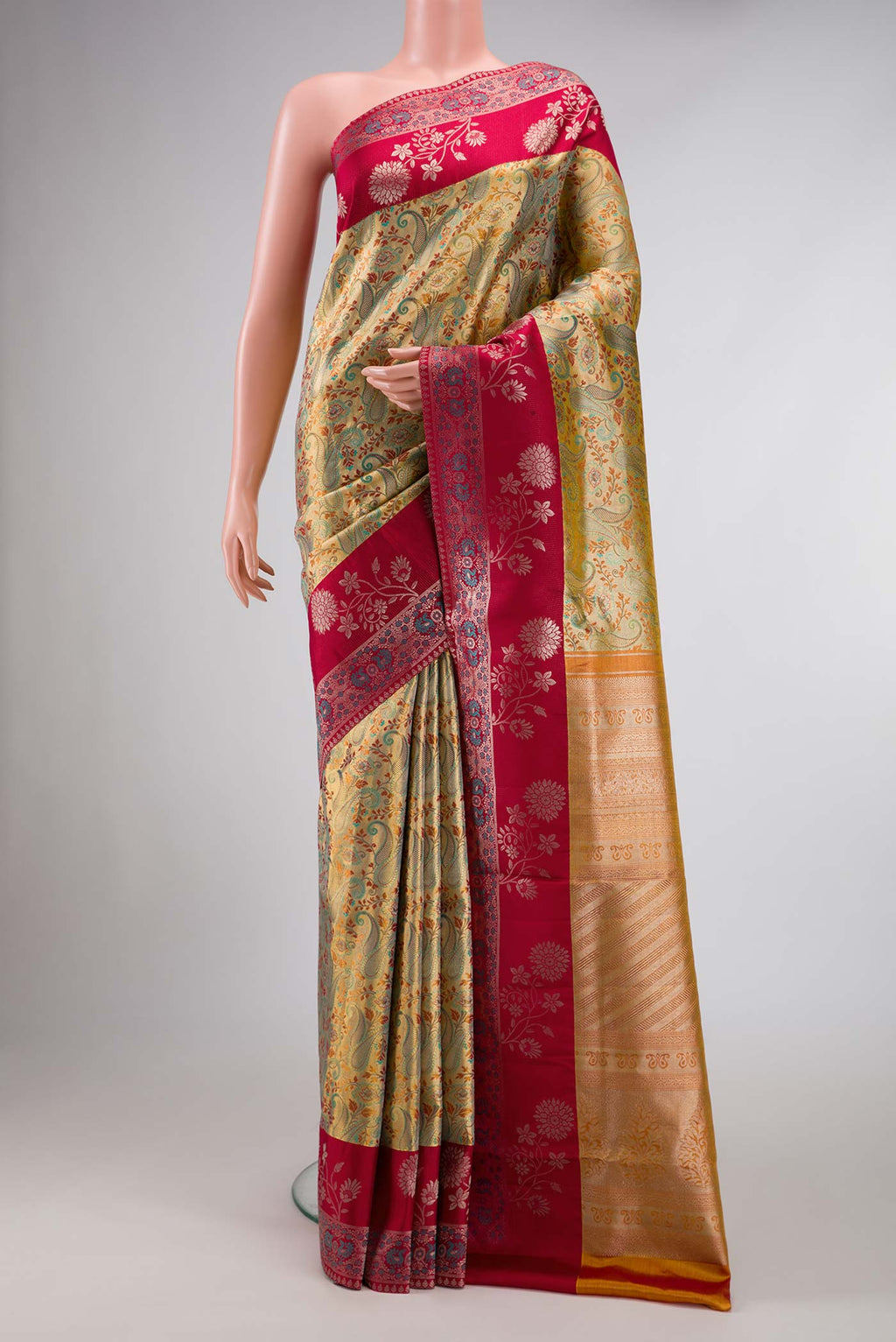 Gold Dual Tone Kanchipuram Silk Saree with Zari Brocade on the body and Fancy Border displayed on a mannequin