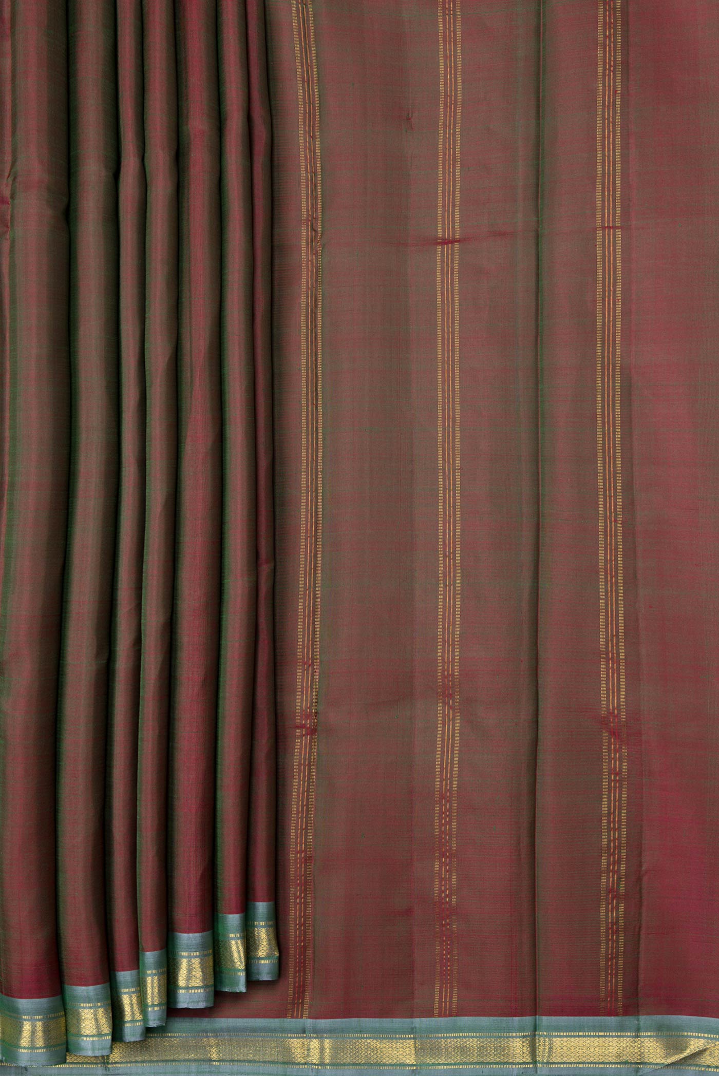 Pleats and pallu of Mehandi Green Dual Tone Kanchipuram Saree with Plain Body and Zari Border. 