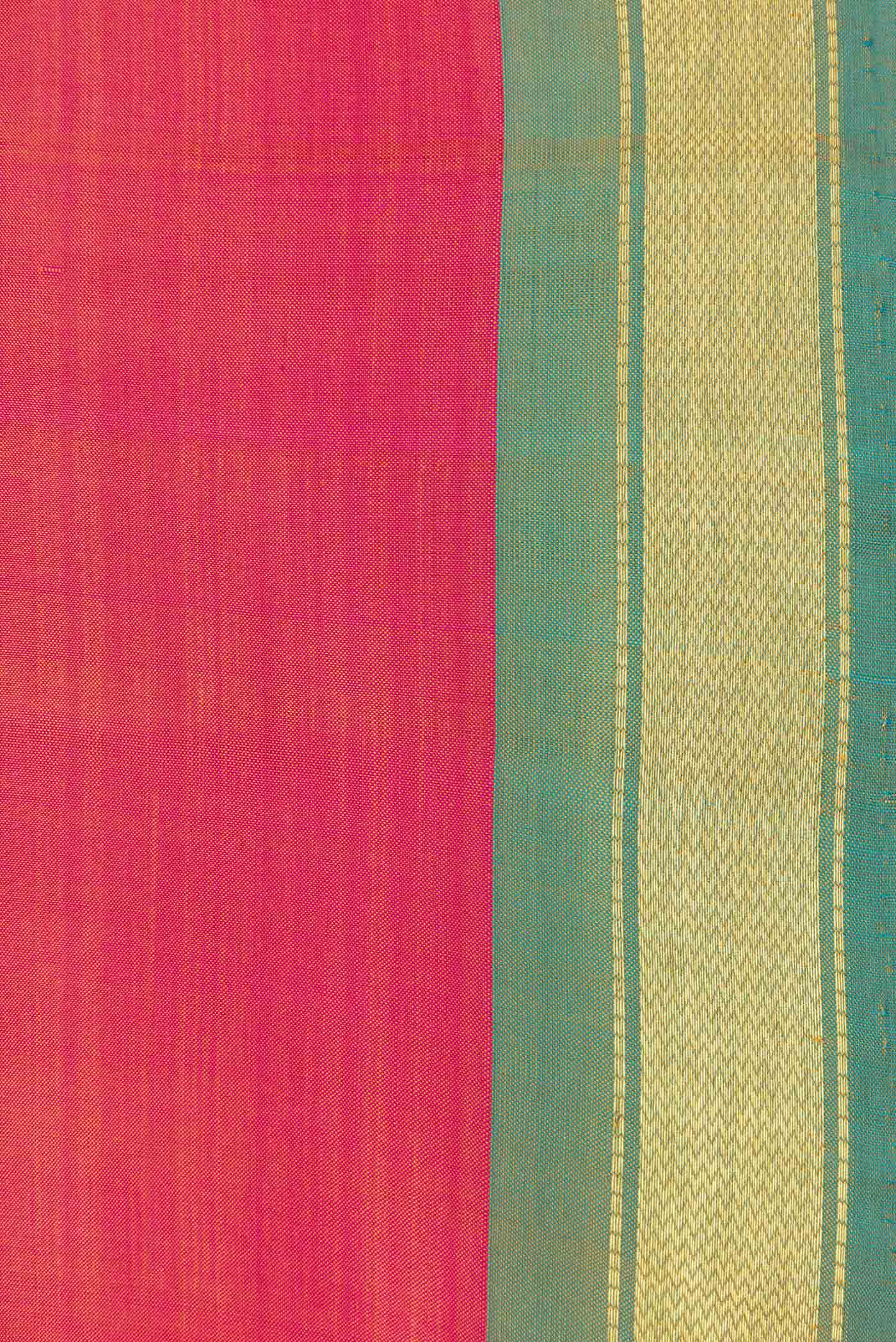 Border image of Pink Dual Tone Kanchipuram Saree with Plain Body and Zari Border. 