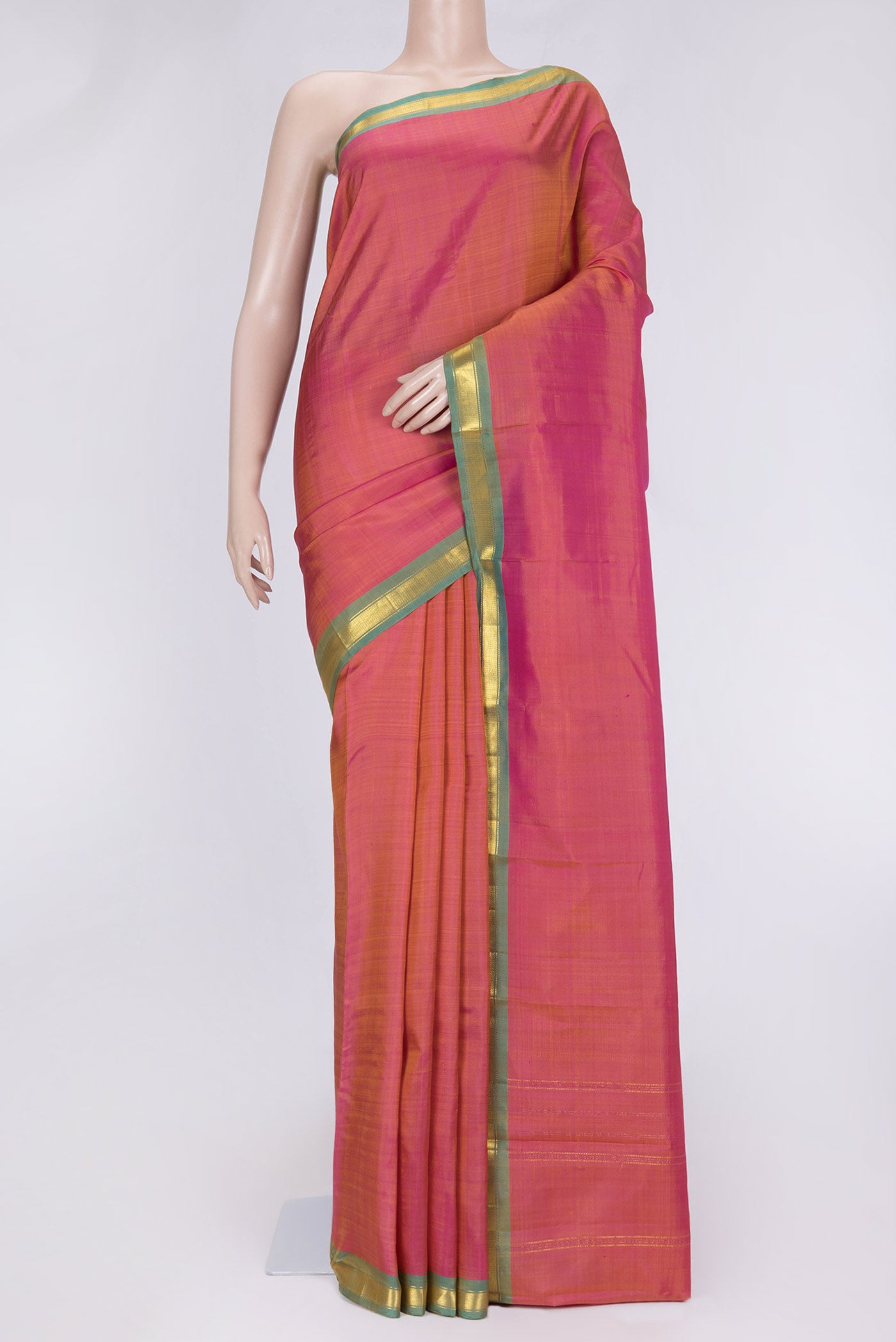 Pink Dual Tone Kanchipuram Saree with Plain Body and Zari Border.  displayed on a mannequin