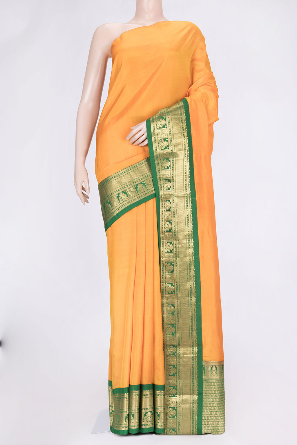 Yellow Dual Tone Kanchipuram Saree with Plain Body and Zari Border.  displayed on a mannequin