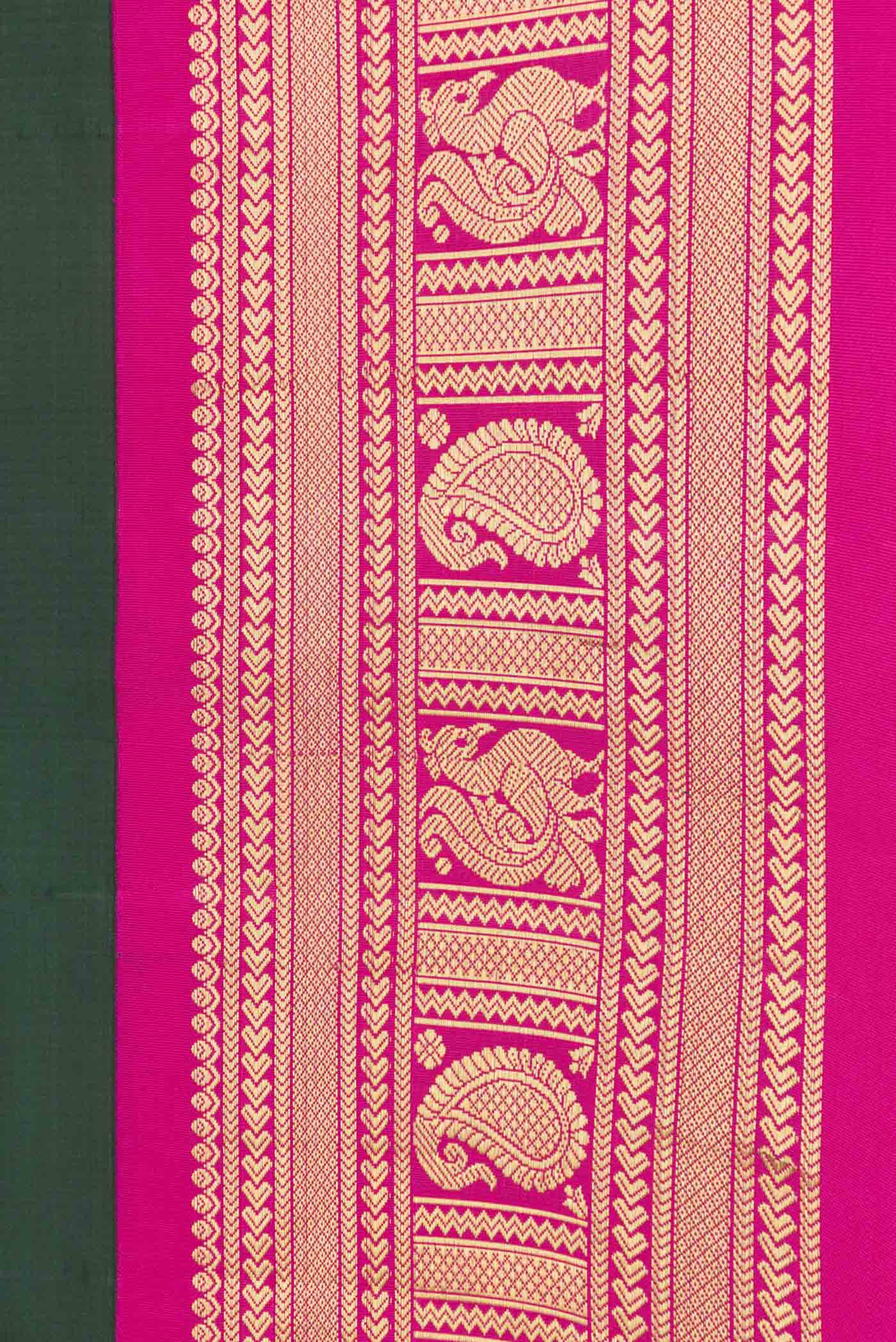 Border image of Bottle Green Dual Tone Kanchipuram Saree with Plain Body and Zari Border. 