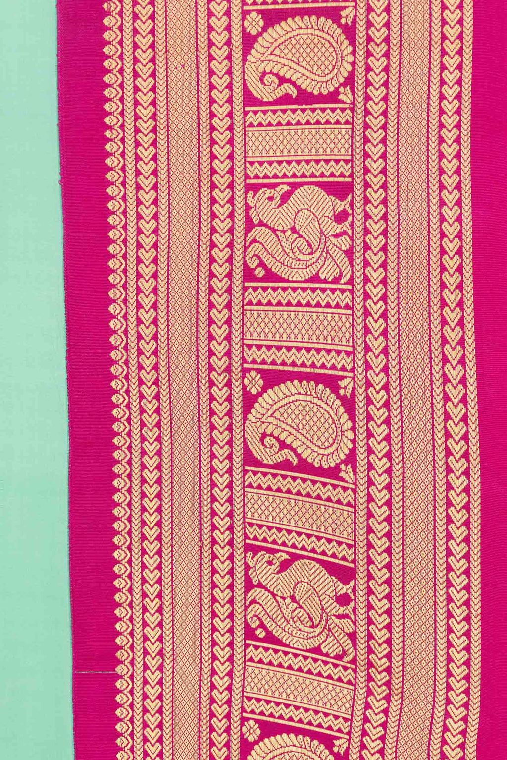 Border image of Pista Green Dual Tone Kanchipuram Saree with Plain Body and Zari Border. 