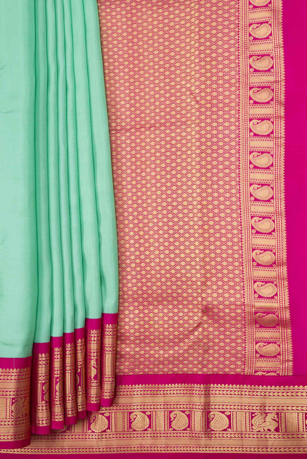 Pleats and pallu of Pista Green Dual Tone Kanchipuram Saree with Plain Body and Zari Border. 