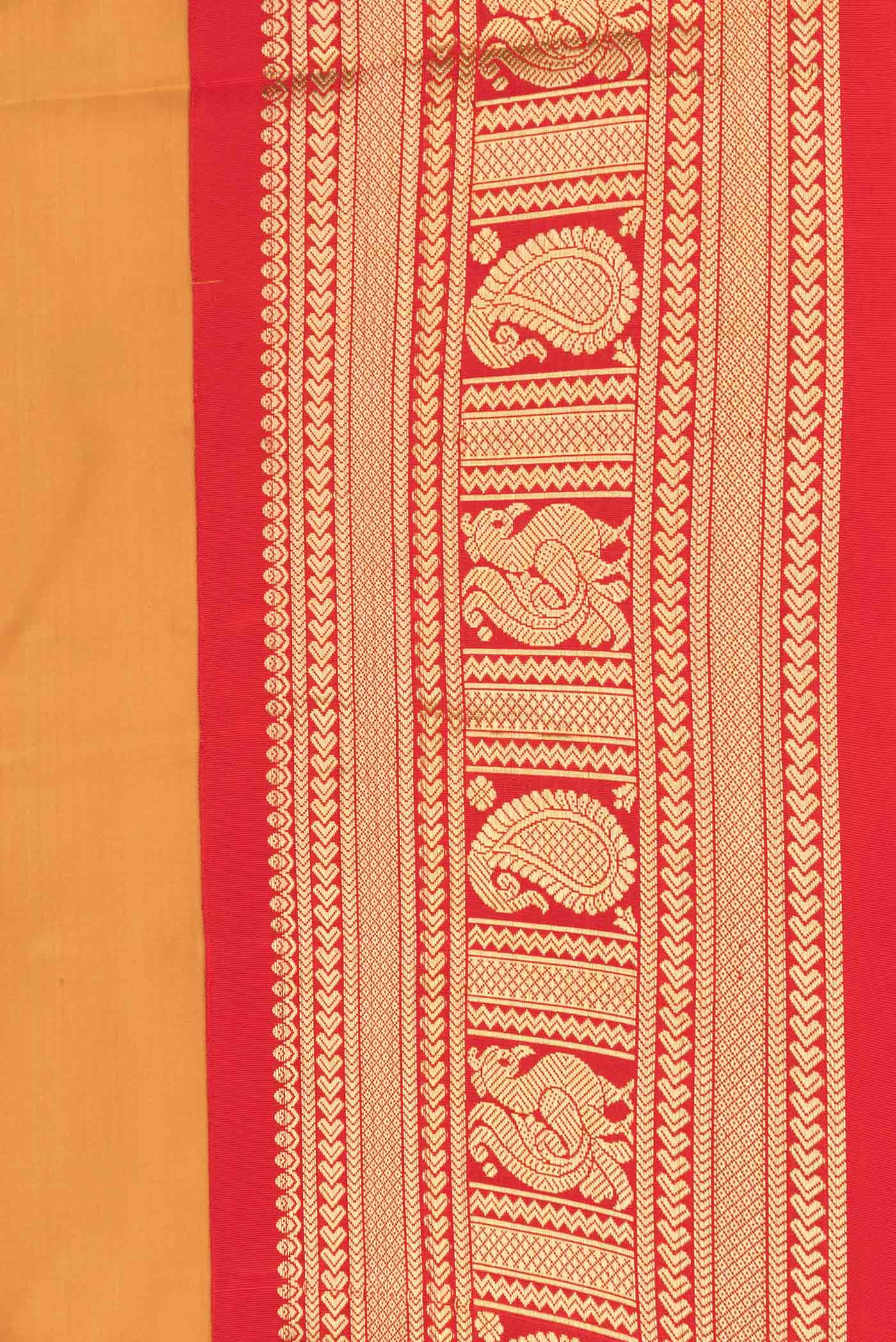 Border image of Mustard Dual Tone Kanchipuram Saree with Plain Body and Zari Border. 