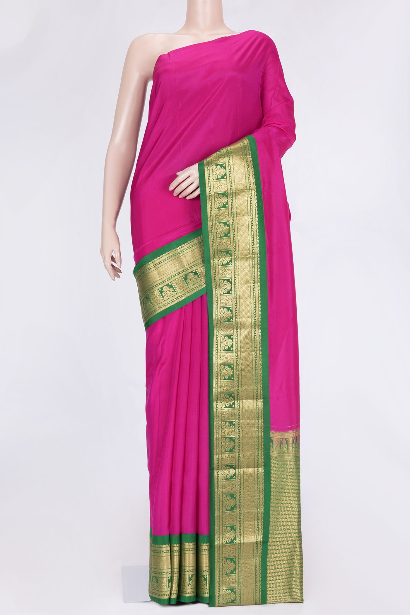 Pink Dual Tone Kanchipuram Saree with Plain Body and Zari Border.  displayed on a mannequin