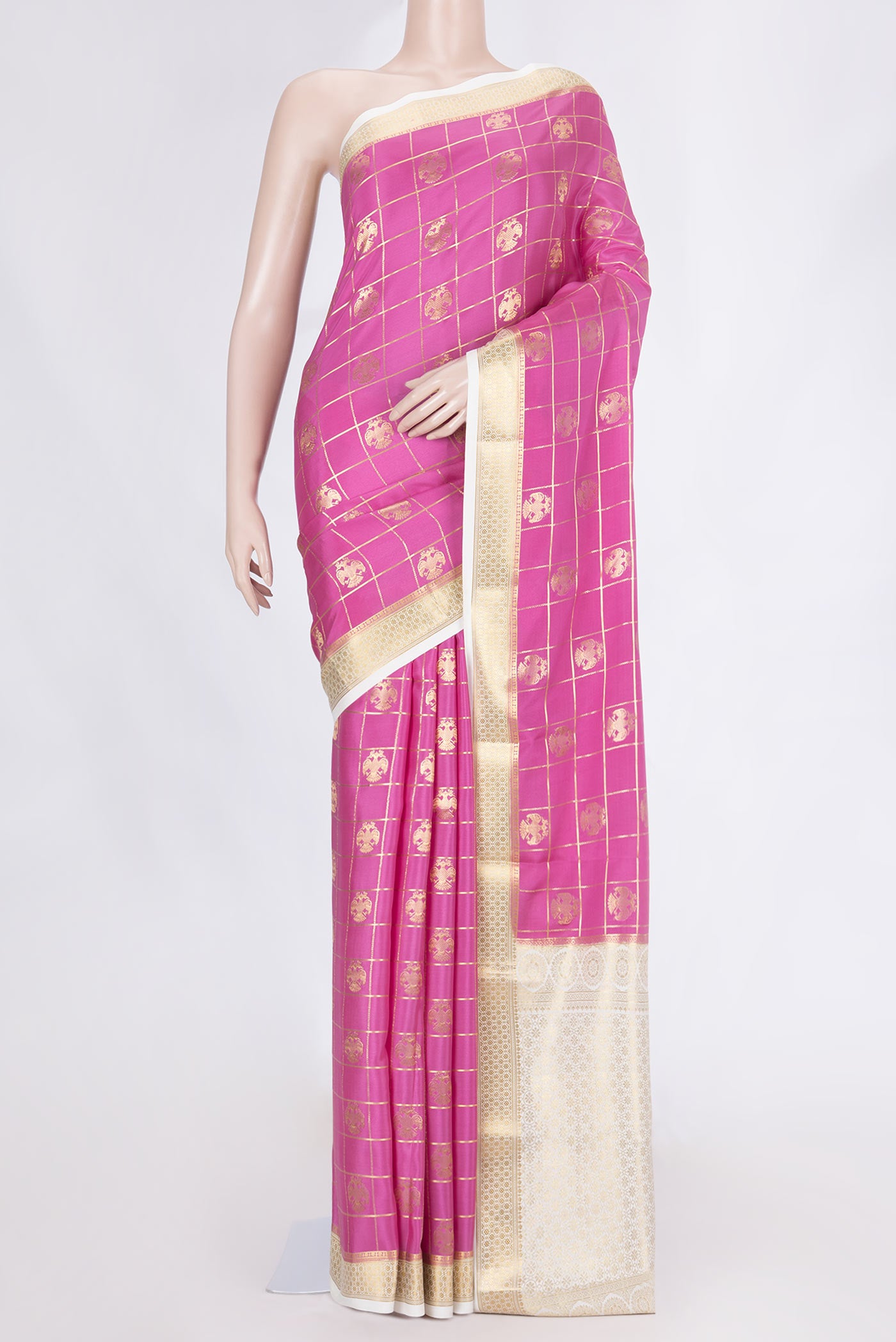 Pink Dual Tone Mysore Crepe Saree with Checked design on the body and Zari Border displayed on a mannequin