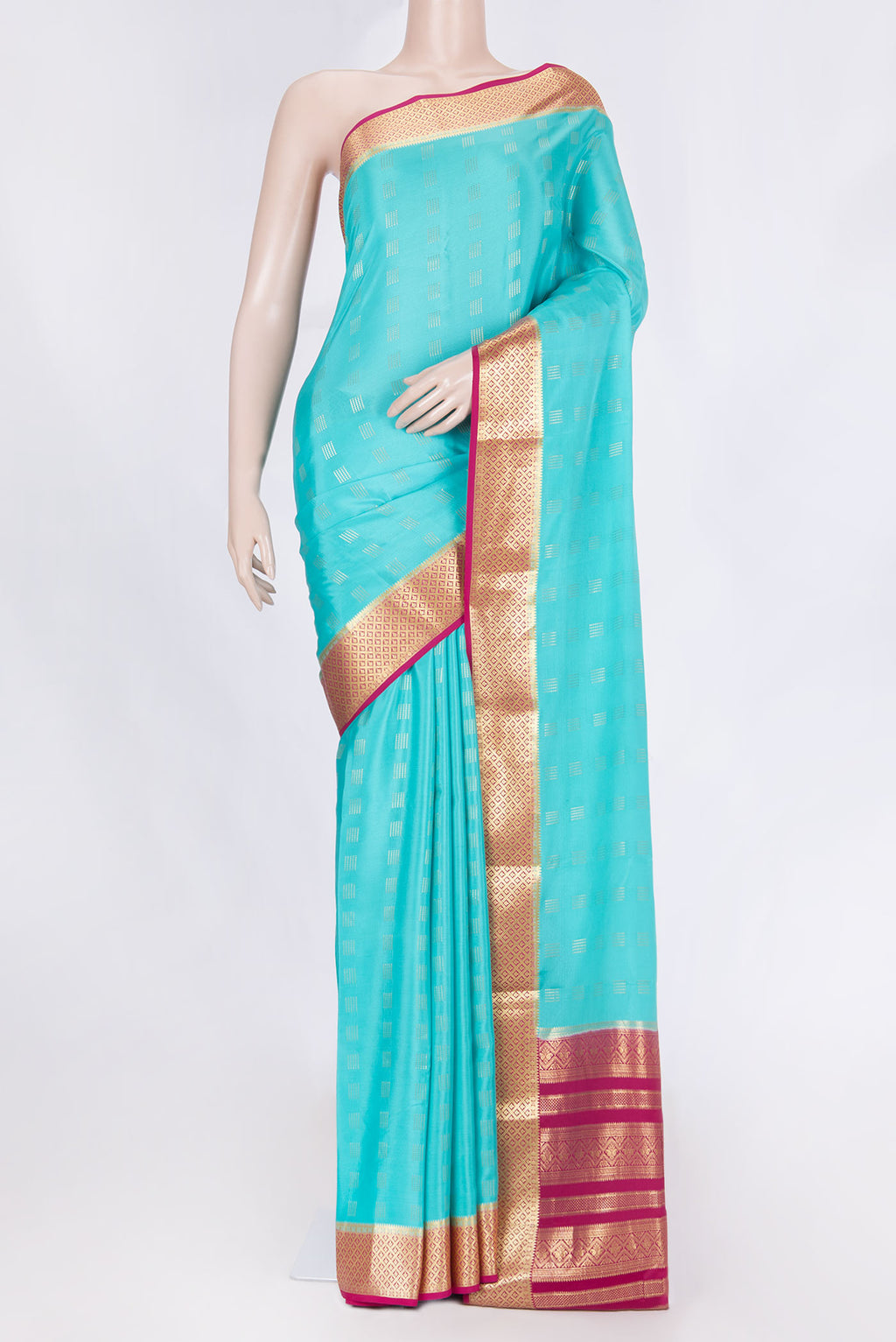 Sky Blue Dual Tone Mysore Crepe Saree with Zari Butta on the body and Zari Border displayed on a mannequin