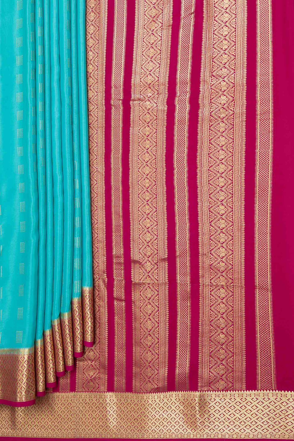 Pleats and pallu of Sky Blue Dual Tone Mysore Crepe Saree with Zari Butta on the body and Zari Border
