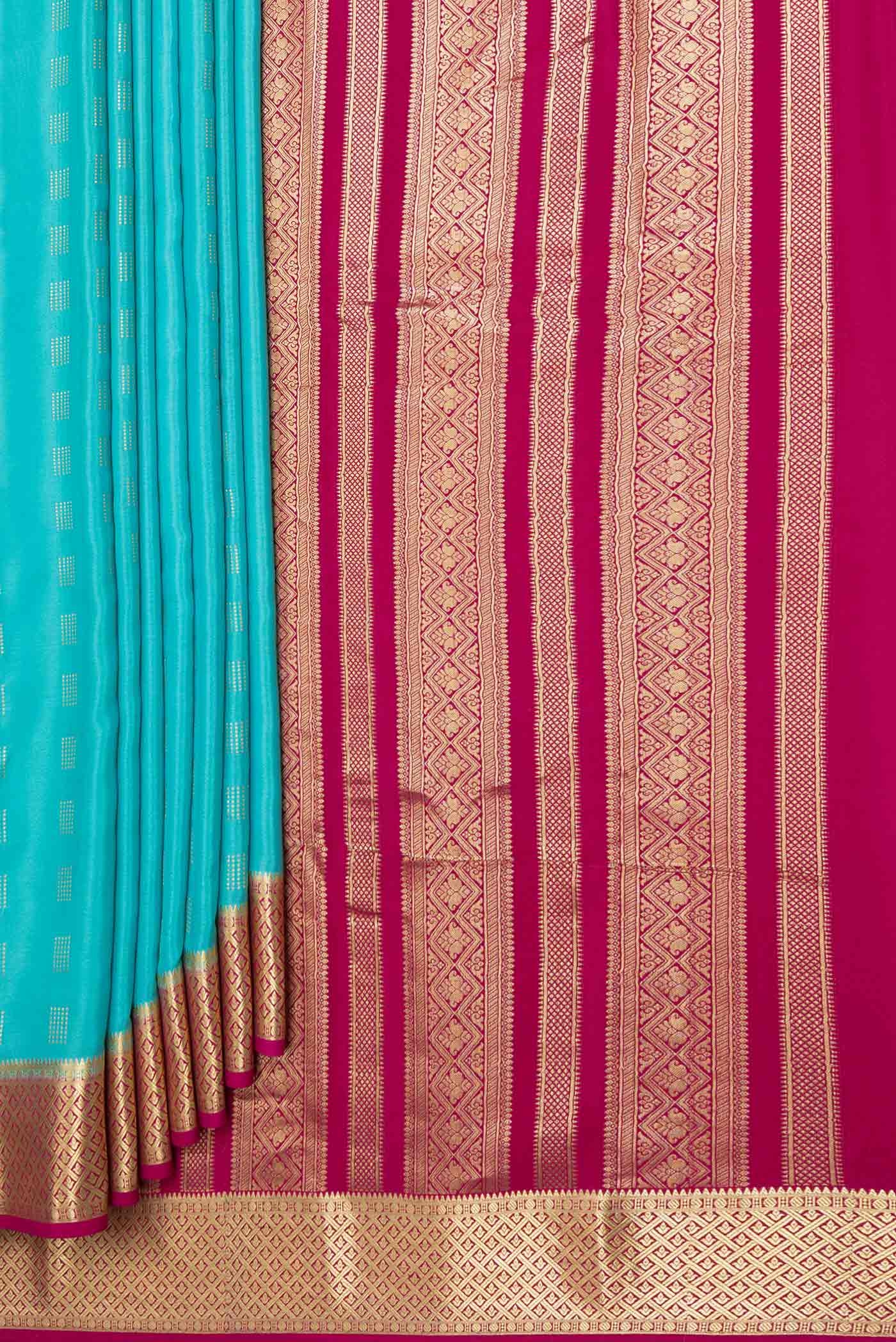 Pleats and pallu of Sky Blue Dual Tone Mysore Crepe Saree with Zari Butta on the body and Zari Border