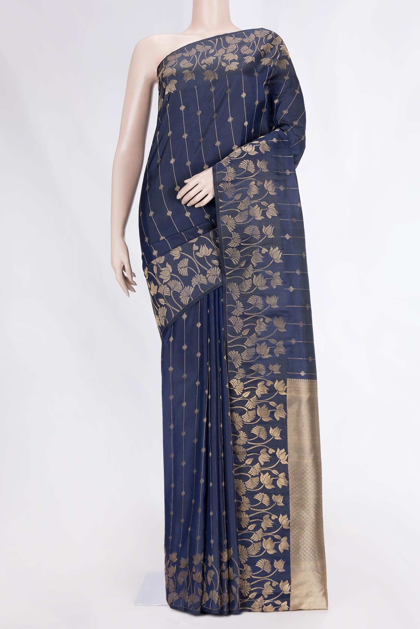 Navy Blue Dual Tone Kanchipuram Silk Saree with Zari Butta on the body and Fancy Border displayed on a mannequin