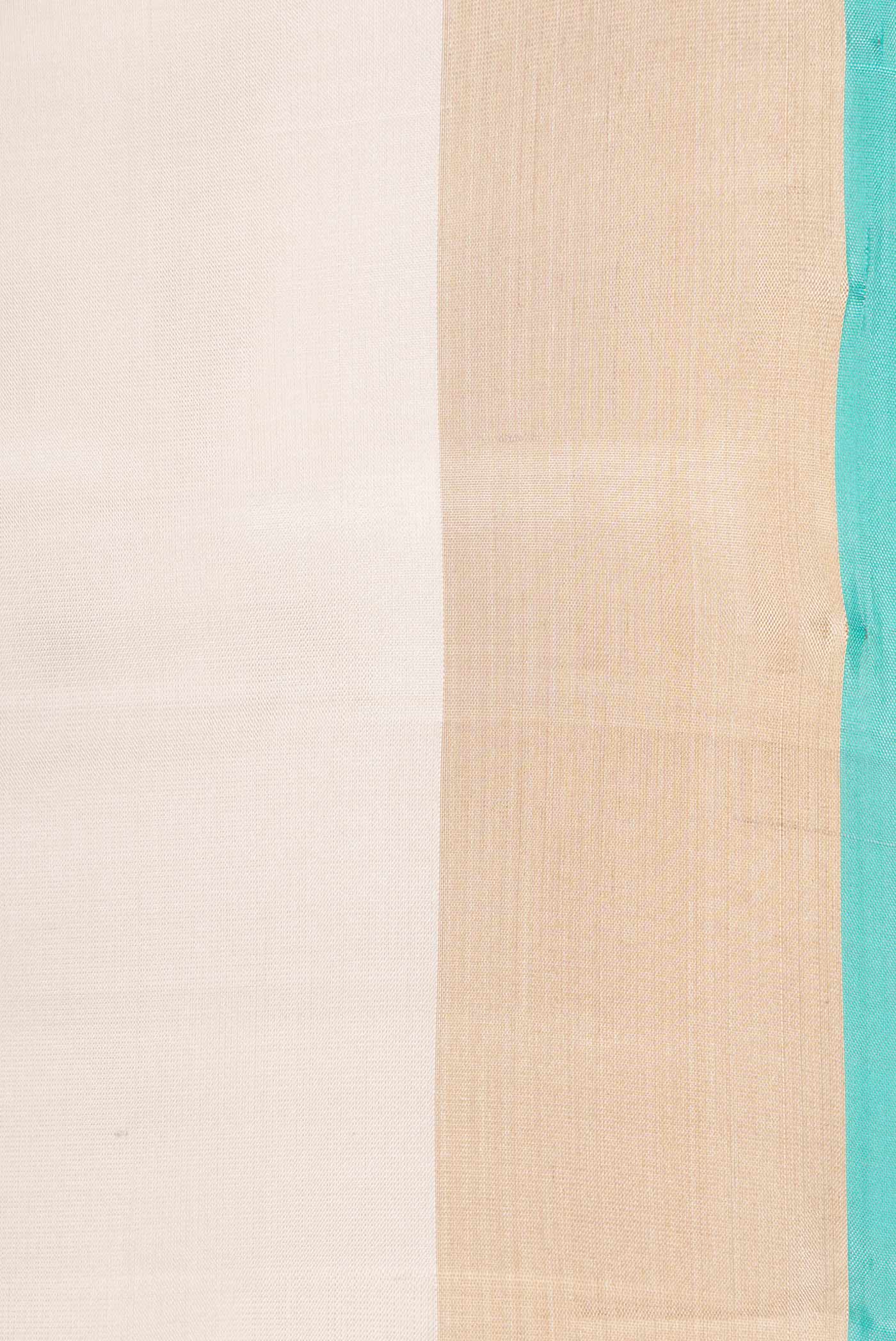 Border image of Beige Dual Tone Soft Silk Saree with Zari Butta on the body and Zari Border. 