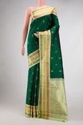 Pure Silk Pure Zari Bottle Green Dual Tone Kanchipuram Saree with Zari Butta on the body and Zari Border displayed on a mannequin