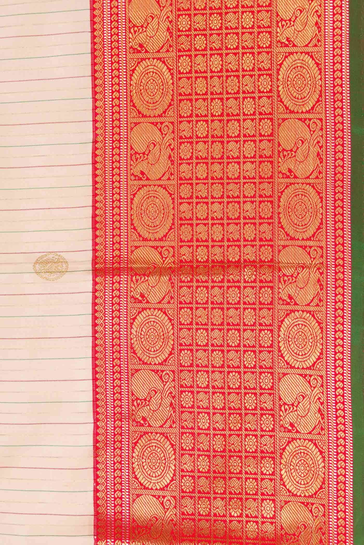 Border image of Pure Silk Pure Zari Rose Gold Dual Tone Kanchipuram Saree with Stripes on the body and Zari Border