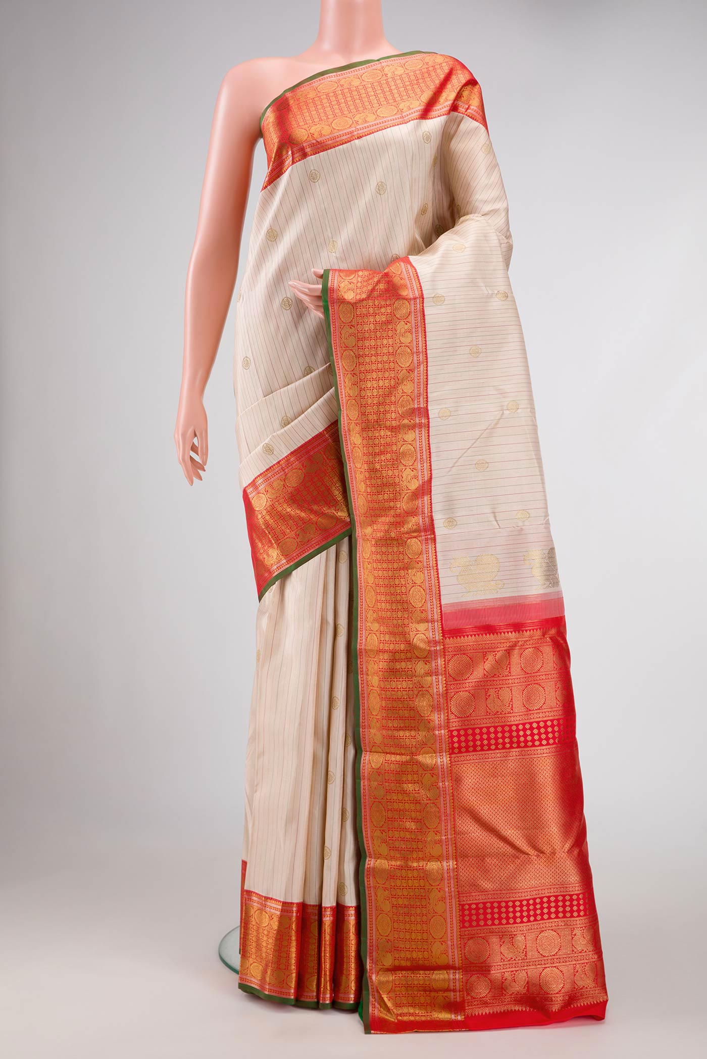 Pure Silk Pure Zari Rose Gold Dual Tone Kanchipuram Saree with Stripes on the body and Zari Border displayed on a mannequin