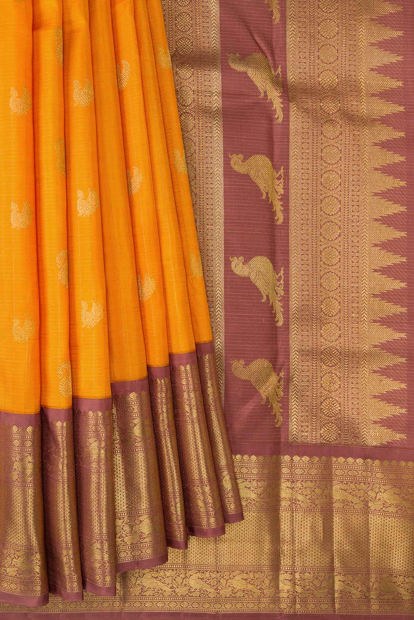 Pleats and pallu of Pure Silk Pure Zari Yellow Kanchipuram Saree with Checked design on the body and Zari Border